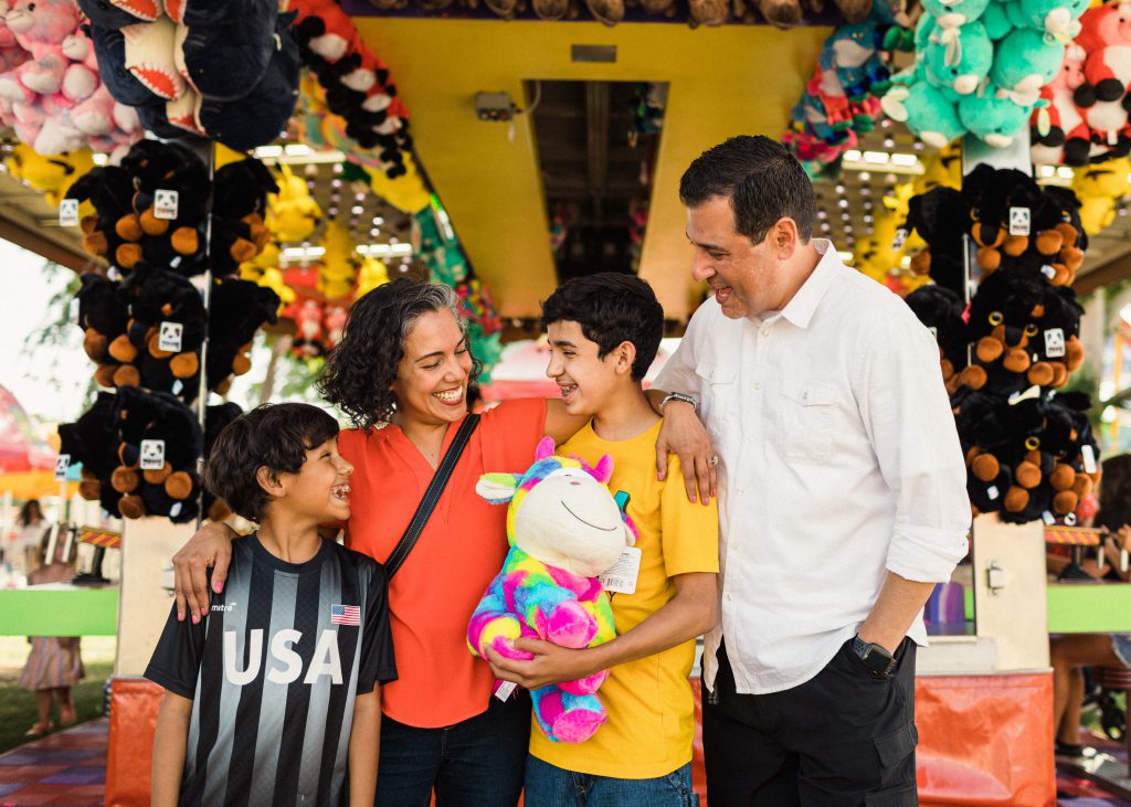 Family Enjoying Carnival at Fair